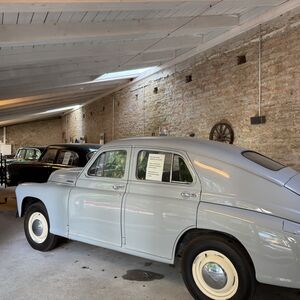 Old garage with Soviet era knock-offs of American Cars