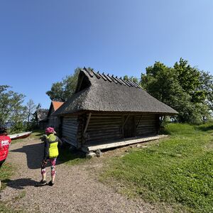 Old fishing huts with thatched roofs