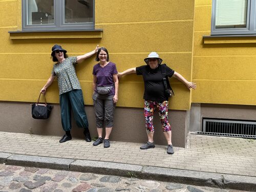 Holding up the wall